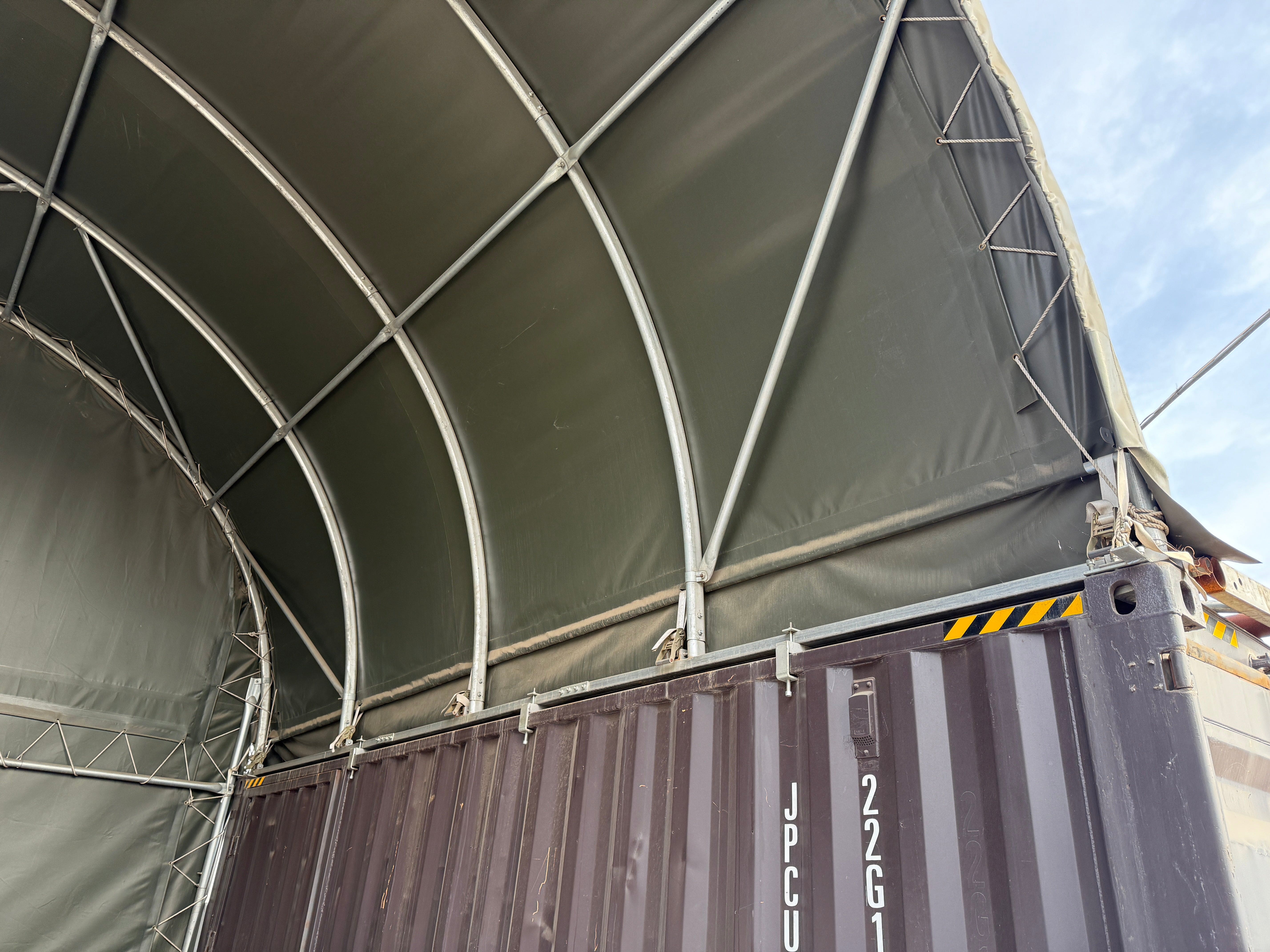 Lukket bagpanel til containeroverdækninger